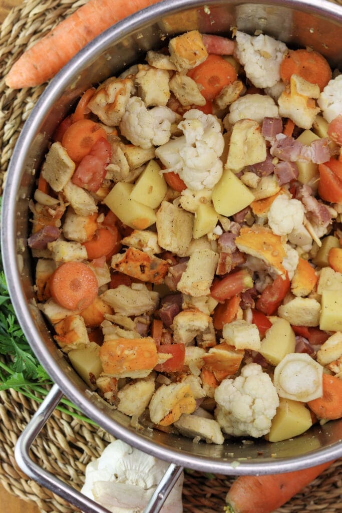 Vegetables added to the chicken of the woods soup.